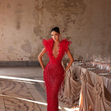 Juna - Feather plunge beaded gown